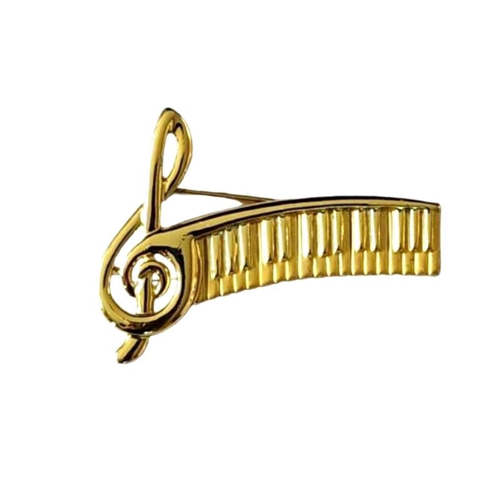 5/$25 Vintage AJC gold music note brooch
